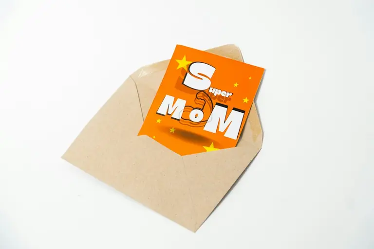Super mom card in a brown envelope