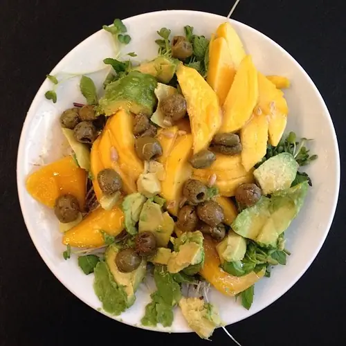 My typical meal this week: a big salad with mixed sprouts (alfalfa sprouts, flaxseed sprouts, pea sprouts), mixed leaves (sweet basil, mint, peppermint), mango and avocado, with a honey and lemon dressing, accompanied by a glass of almond milk or coconut