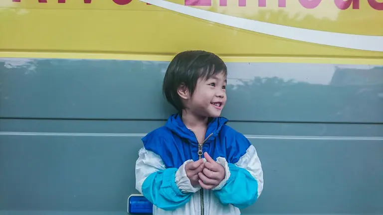 girl in blue zip up jacket