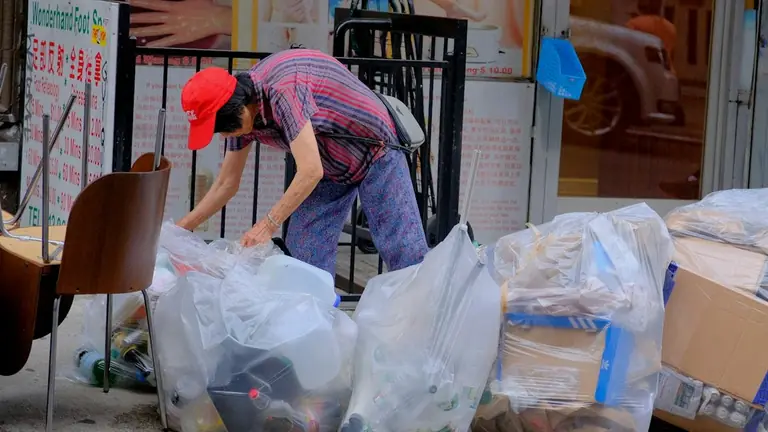 man opening clear plastic case